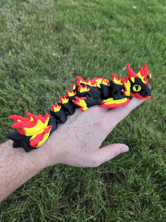 Eternal Flame Wyvern articulated dragon fidget coiled on a forearm